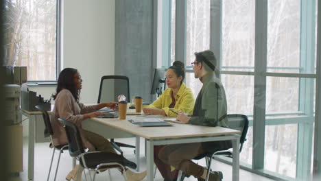 Multiethnic-Business-Team-Having-Meeting-in-Modern-Office